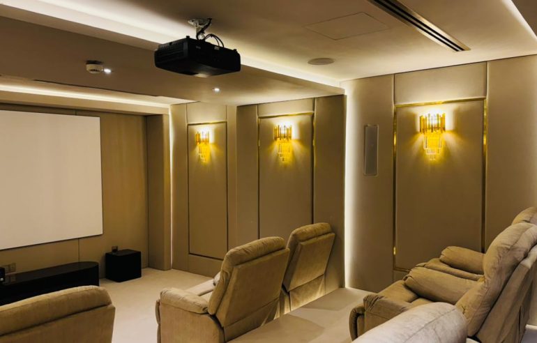 Home Cinema Interiors: Avoid Costly Budget vs Luxury Mistakes 3 Home cinema interiors showing budget and luxury design choices with lighting and sound setup