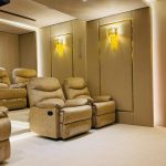 Custom home cinema design for luxury villas in Dubai with high-end seating, smart automation, and premium audio