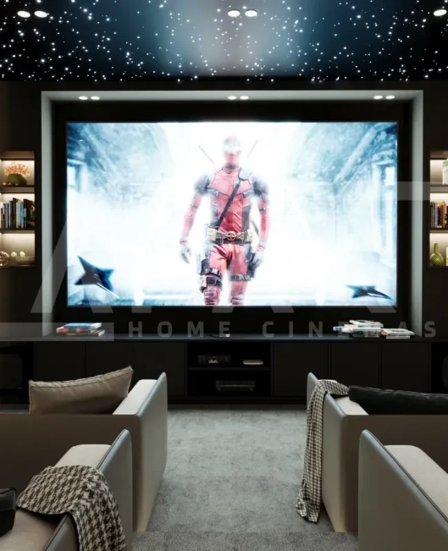 Modern luxury home cinema featuring fibre optic lighting, plush recliner seating, and a cinematic star ceiling.